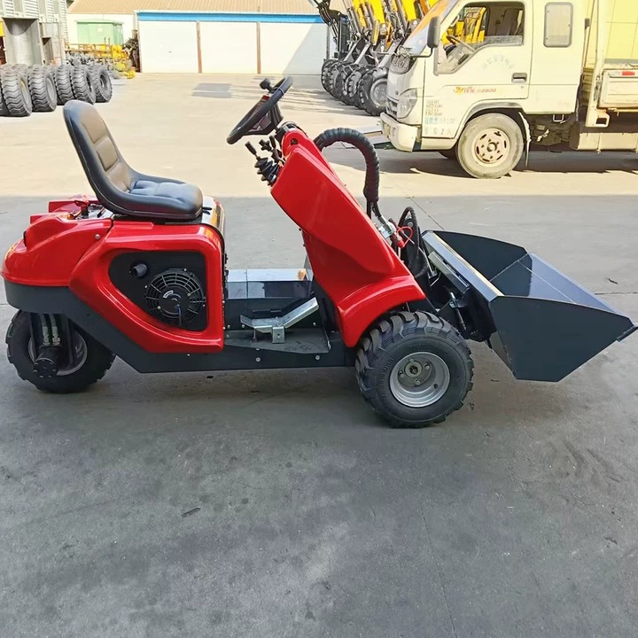 Mini-chargeuse 3 roues C35 : vue de profil avec godet et siège ergonomique